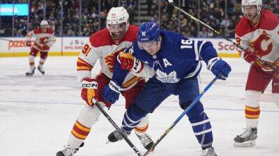 NHL roundup: Maple Leafs slide by Flames in OT