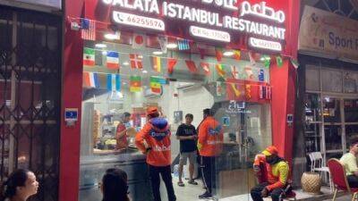 A friendly shawarma shop unwittingly serves up comfort during a difficult World Cup