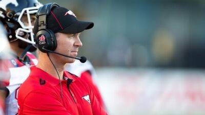 Stampeders coach Dave Dickenson adds GM duties as Hufnagel steps down