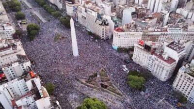 Thousands flood Buenos Aires streets as Argentina reach World Cup final