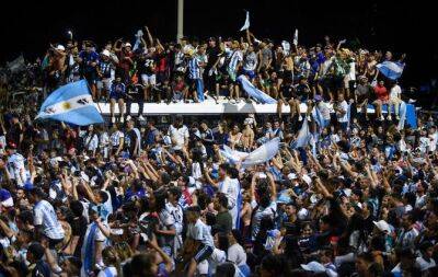 World Cup winners Argentina arrive back in Buenos Aires