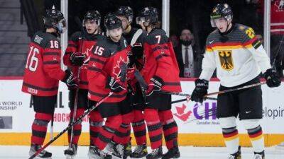 Shane Wright - Connor Bedard - Bedard shines as Canada demolishes Germany to bounce back at world juniors - cbc.ca - Germany - Canada