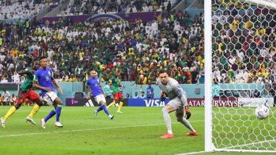 Cameroon go out on their shield after stunning Brazil