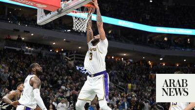Anthony Davis, LeBron James take charge as Lakers beat Bucks in thriller