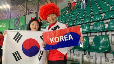 Ricardo Horta - 'Fighting for their life': South Korean fans enjoy Portugal victory, progression to World Cup knockout stage - channelnewsasia.com - Qatar - Portugal - Ghana - Uruguay - South Korea - North Korea