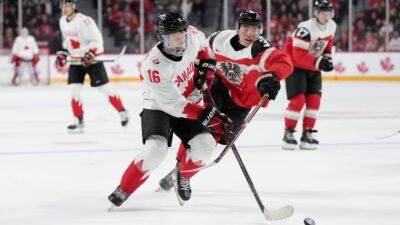 Shane Wright - Connor Bedard - Bedard's 6 points power Canada past Austria for 2nd straight blowout win at world juniors - cbc.ca - Sweden - Germany - Canada - Austria - Jordan