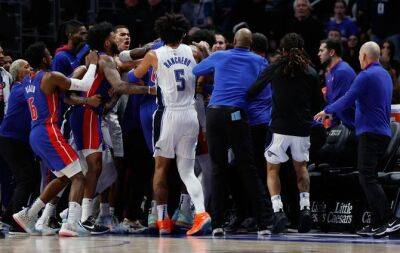 NBA suspends 11 players after Pistons-Magic scuffle