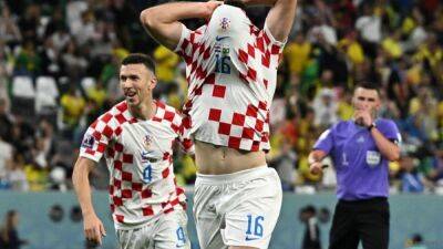 Dejan Lovren - Dominik Livakovic - Zlatko Dalić - Bruno Petkovic - 'Don't stop believing' say Croats before knocking Brazil out - channelnewsasia.com - Qatar - Croatia - Brazil - Japan