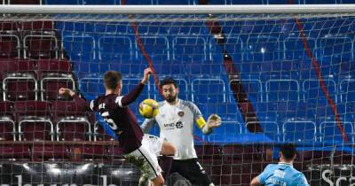 Hearts booed off as Dundee stun Tynecastle to climb off the bottom of the table