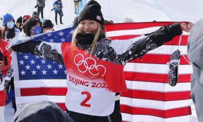 Chloe Kim dominates snowboard halfpipe to win second successive Olympic gold