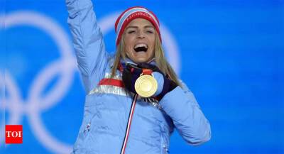 Winter Olympics: Norway's Johaug powers to gold in 10km classic