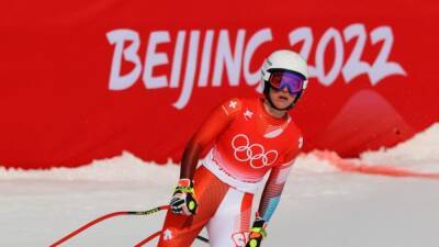 Alpine skiing-Switzerland's Gut-Behrami wins super-G gold
