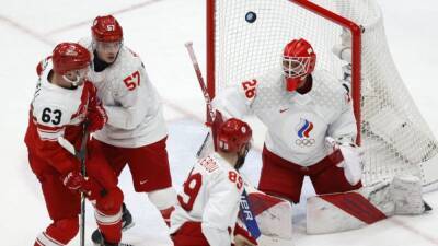 Ice hockey-Unbeatable Fedotov stars again in ROC win over Denmark