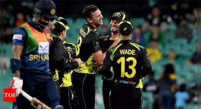 Glenn Maxwell - Marcus Stoinis - Josh Hazlewood - Aaron Finch - Josh Inglis - Adam Zampa - Sydney Cricket Ground - Hazlewood stars as Australia beat Sri Lanka by 20 runs in rain-hit opening T20I - timesofindia.indiatimes.com - Australia - Dubai - Sri Lanka