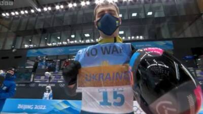 Boris Johnson - Winter Olympics: Ukrainian skeleton athlete Vladyslav Heraskevych holds up 'No War' sign - bbc.com - Russia - Ukraine - Beijing - Belarus