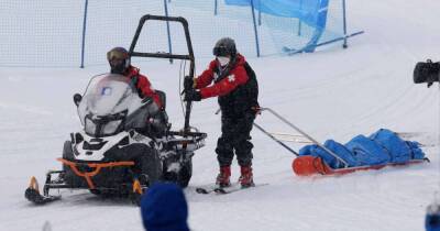 Olympics-Snowboarding-Australian Brockhoff crashes, taken off course on stretcher