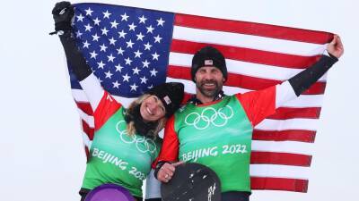 Winter Olympics 2022 - Lindsey Jacobellis wins second gold in mixed team snowboard cross with Nick Baumgartner