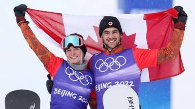Mark Macmorris - Olympic wake-up call: O'Dine overcomes a snowboard to the head for 2nd medal - cbc.ca - Italy - Canada - Beijing - county Prince George
