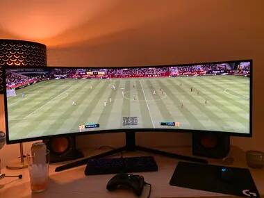 Lad Builds The Ultimate FIFA Setup Using 49-Inch Monitor So He Can See Entire Pitch - sportbible.com