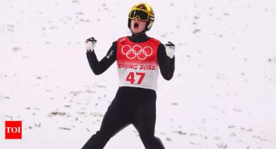 Beijing Winter Olympics: Lindvik takes large hill gold for Norway