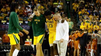 Baylor's Jonathan Tchamwa Tchatchoua suffers knee injury running court vs. Texas - espn.com - Cameroon - state Texas - state Kansas - county Baylor