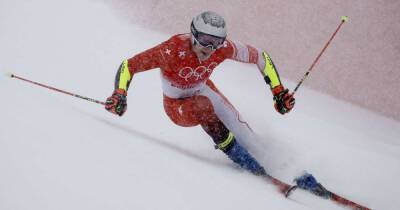 Olympics-Alpine skiing-Favourite Odermatt holds narrow lead after giant slalom first run