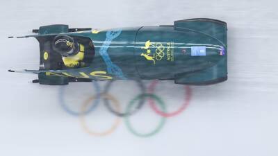Australia's Bree Walker seventh at halfway stage of inaugural Winter Olympic monobob competition in Beijing