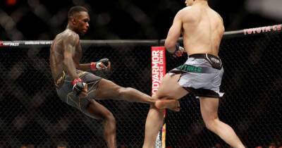 Israel Adesanya retains UFC middleweight title with points win over Robert Whittaker