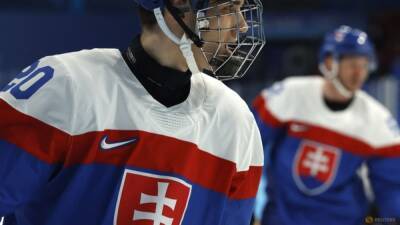 Ice hockey-Teen Slafkovsky leads Slovakia to first Beijing win