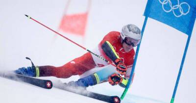 Winter Olympics 2022 day nine: Odermatt takes giant slalom gold, ice hockey and curling – live!