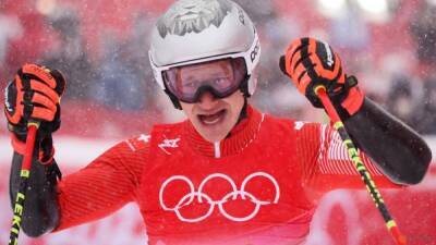 Olympics - Alpine skiing - Odermatt's calculated risk earns Swiss third Alpine gold