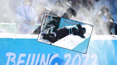 'Oh! Straight over the barrier!' - Rong Ge crashes, celebrates after big air jump at Beijing Winter Olympics