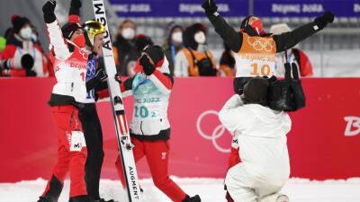 Winter Olympics 2022 - Austria win gold in tense team event to close ski jumping programme