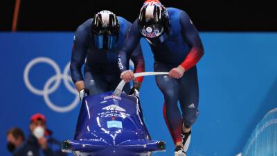 Francesco Friedrich - Winter Olympics 2022 - Team GB medal hopes fade in two-man bobsleigh as Germans dominate again - eurosport.com - Britain - Russia - Germany - Beijing - Austria