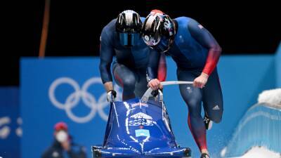 Brad Hall’s medal hopes in two-man bobsleigh all but over in Beijing