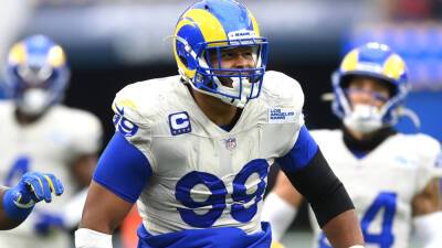 Rams general manager 'not buying' Aaron Donald retirement reports: 'He’ll get bored and need something to do'