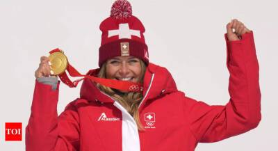 Beijing 2022: Corinne Suter confirms Swiss dominance with Olympic downhill gold