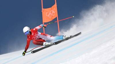 Lindsey Vonn - Sofia Goggia - Corinne Suter - Suter confirms Swiss dominance with Olympic downhill gold - channelnewsasia.com - Switzerland - Italy - Usa - Beijing