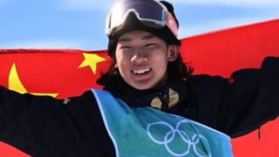 Winter Olympics: Chinese teenager Su Yiming wins snowboard gold in men's big air