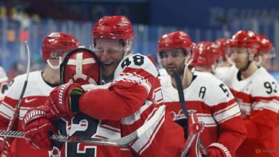 Ice hockey: Germany out, debutants Denmark reach quarter-finals - channelnewsasia.com - Russia - Finland - Germany - Denmark - Usa - Beijing - Latvia - Slovakia