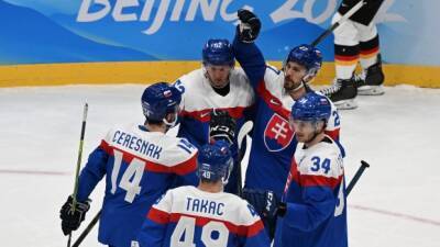 Slovakia tops Germany, will face USA in Olympic men's hockey quarters; Denmark beats Latvia - tsn.ca - Russia - Sweden - Finland - Germany - Denmark - Switzerland - Usa - Canada - China - Beijing - Czech Republic - state Minnesota - Latvia - Slovakia