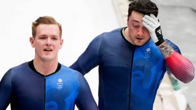 Brad Hall - GB pair Brad Hall and Nick Gleeson crash on third run in two-man bobsleigh - bt.com - Britain