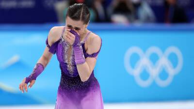 Tearful Kamila Valieva summons up remarkable skate to lead short program after doping scandal at Winter Olympics