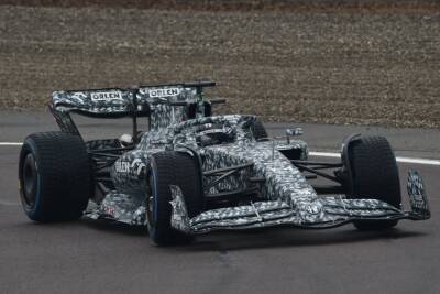 Alfa Romeo's 2022 car hits the track in camouflaged livery