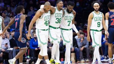 Surging Boston Celtics blow out Philadelphia 76ers but lose Marcus Smart in first half to right ankle sprain