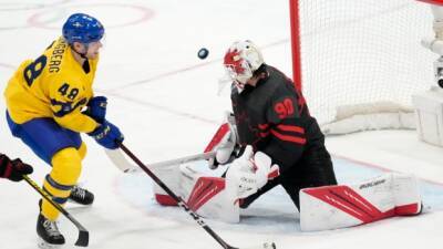 Canada falls to Sweden in men's hockey QF