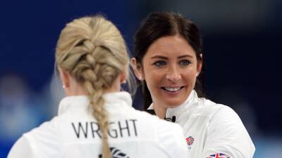 Great Britain’s women curlers survive tense finish to join men in semi-finals