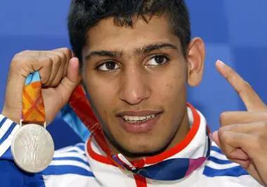 From Getting Knocked Out In 54 Seconds To Becoming World Champion… The Highs And Lows From Amir Khan’s Rollercoaster Career - sportbible.com - Britain - Colombia -  Athens - Ireland - Cuba
