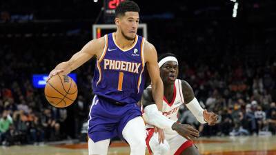 Suns rally without Chris Paul, edging Rockets for 7th straight win