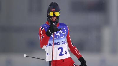 Winter Olympics 2022 - Joergen Graabak wins double gold as Norway win nordic combined team title